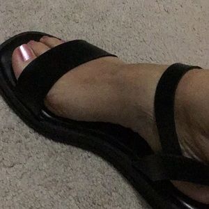 Flat black sandals